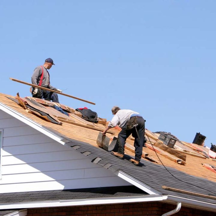 Hard working men on roof