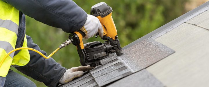 worker drilling the roof